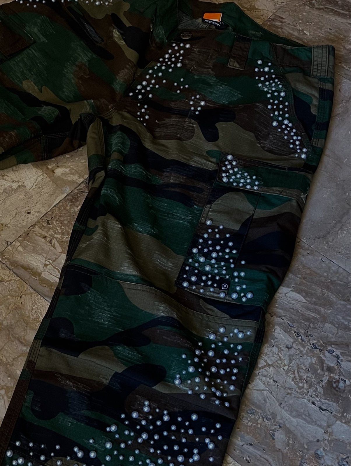 Close up of the pearl panels on the camo military pants