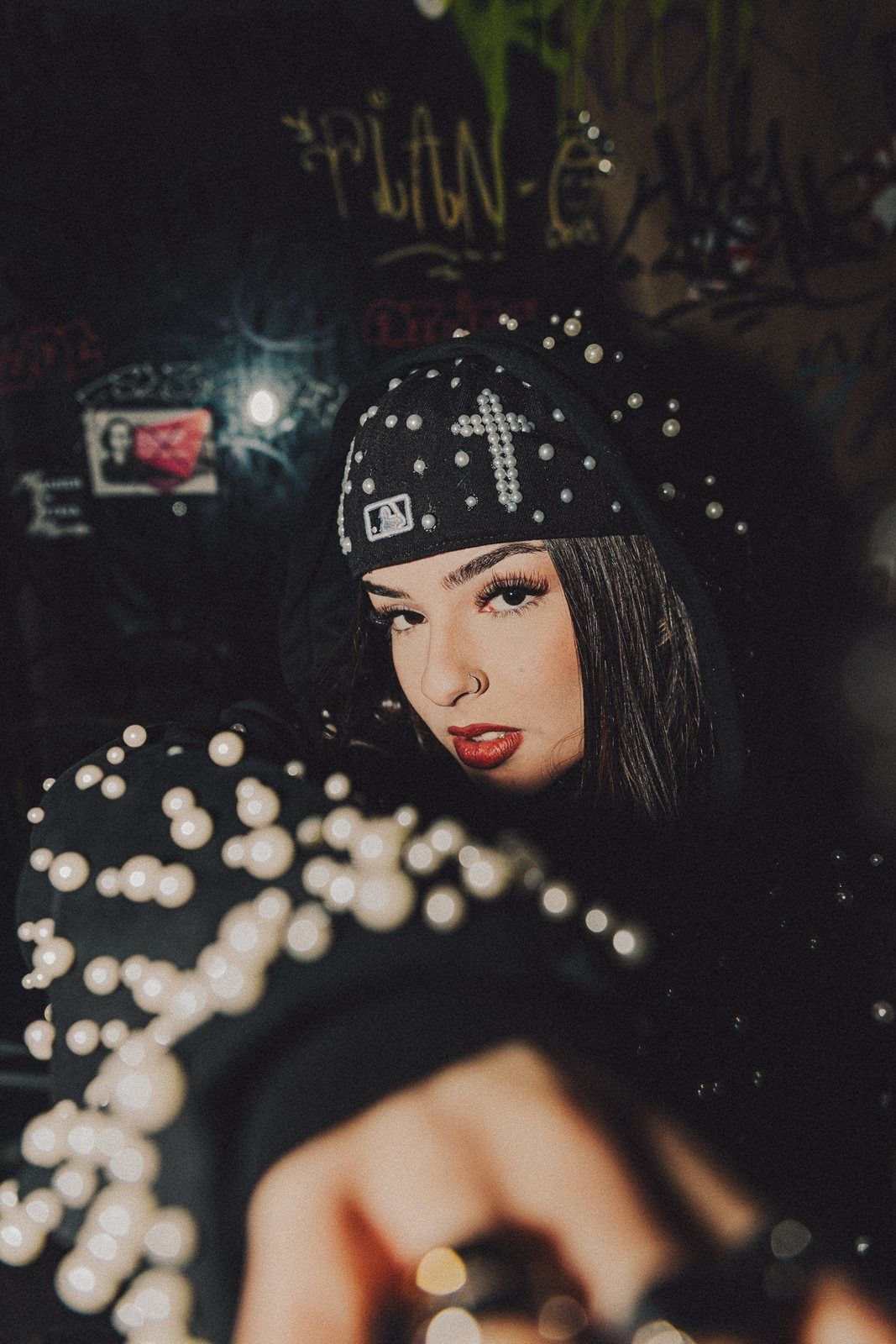 Pearl zip-up at night, pearl sleeve in front of the face
